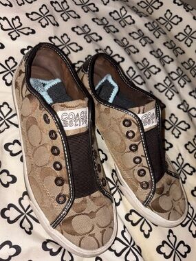 Coach Slip-On Sneakers in Black and Tan with Logo Detail